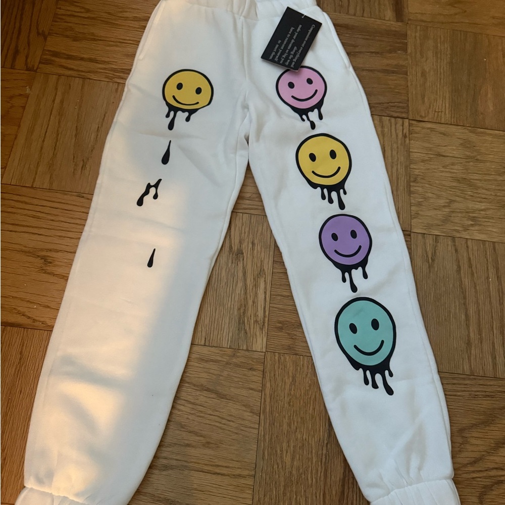 White woman  Joggers with Colorful Smiley Faces